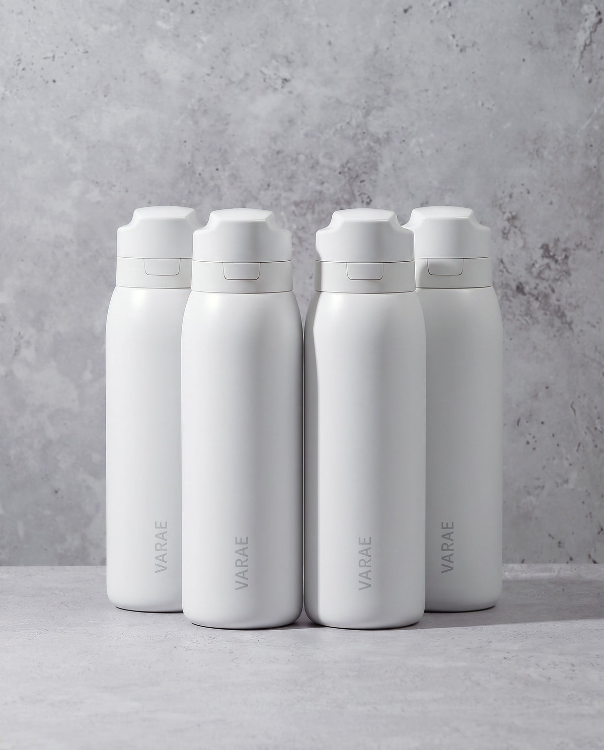 VARAE Family, four white filtered water bottles